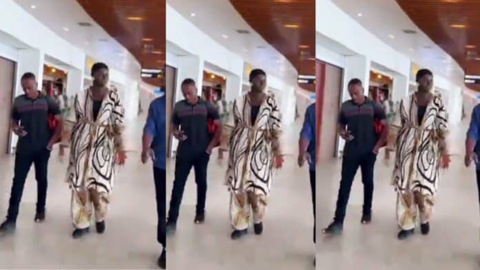 Is this love? Afua Asantewaa Singathon Walks Freely As Her Husband Carries Her Dressing Bag
